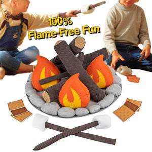 Kids playing with LittleCamp Plush Campfire Set featuring soft logs, plush flames, roasting sticks with marshmallows, and pretend s'mores for safe indoor flame-free fun