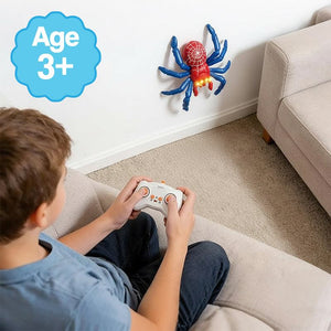 2-in-1 climbing and crawling RC spider toy with remote control and light-up eyes on wall and floor