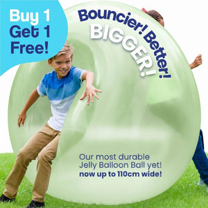 Children playing outdoors with large green inflatable Giant Jelly Balloon Ball promoting active fun and durability