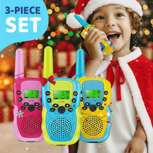 Kids Walkie Talkie 3-piece set in pink, blue, and yellow with a child using one, Christmas themed background