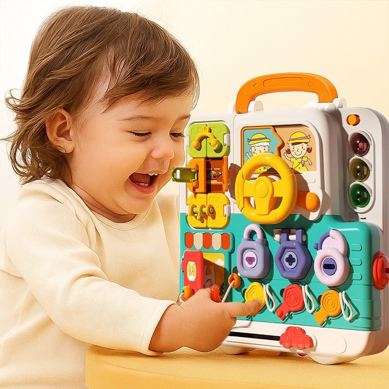 Toddler playing with colorful Busy Board Montessori educational toy for infants with interactive buttons and lights