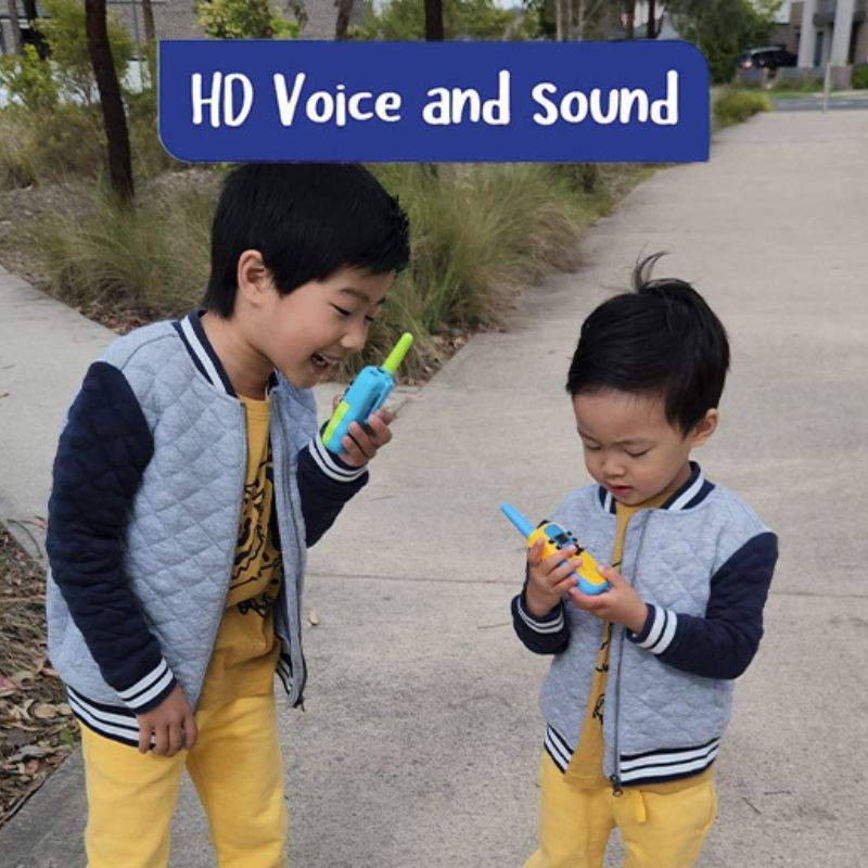 Two kids playing outdoors with colorful kids walkie talkies, featuring clear HD voice and sound.